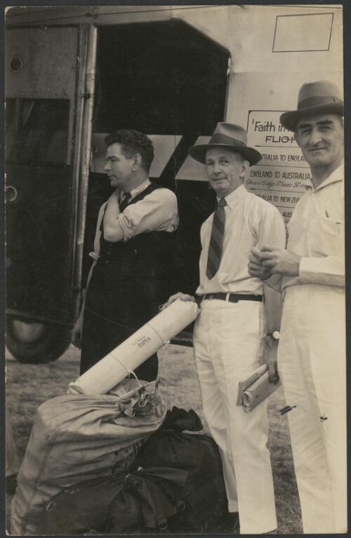 Portrait of Charles Ulm, E. Imlay and L. Drewe in front of Faith in Australia, Avro X monoplane VH-UXX, Port Moresby, 26 July 1934 [picture]