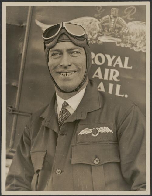 Portrait of Australian National Airways pilot E. Chaseling in front of Royal Air Mail monoplane, ca. 1931 [picture] / J.T. Harrison