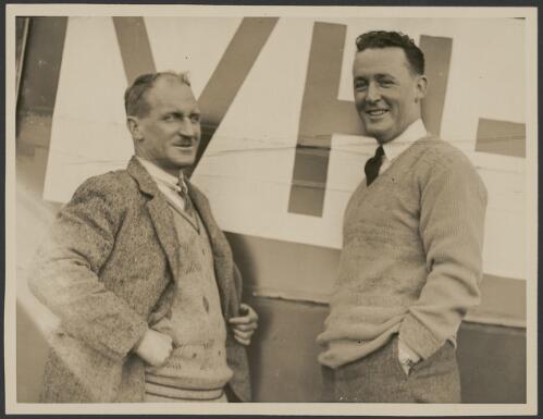 Portrait of two unidentified men in front of a monoplane, ca. 1931 [picture] / J.T. Harrison
