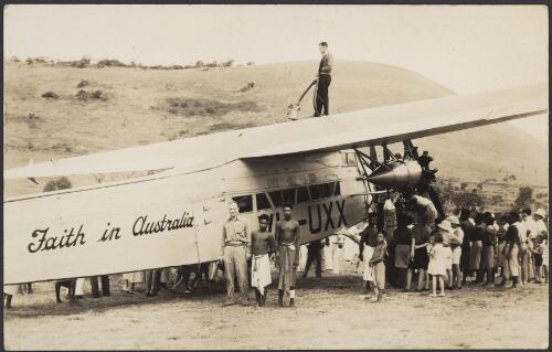 Onlookers surrounding "Faith in Australia" plane VH-UXX as it is refuelled, Port Moresby, Papua New Guinea, 26 July 1934 [picture]