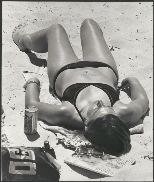 Girl sunbathing on North Cottesloe beach, Perth, Western Australia, ca. 1975, 1 [picture] / Bruce Howard