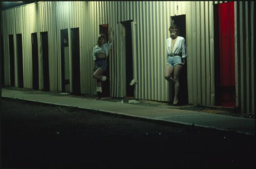 Prostitutes being displayed in brothel hallways on Hay Street, Kalgoorlie, Western Australia, 1988 [transparency] / Robin Smith