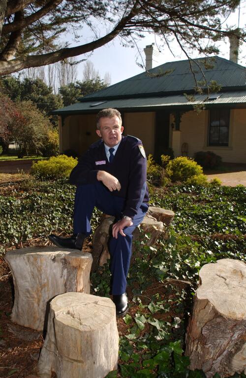 Father Mark Croker in front of the presbytery, Bungendore, New South Wales, 2003 [picture] / Loui Seselja