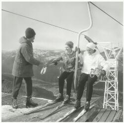 Skiers on the ski lift at middle station, Thredbo, New South Wales ...