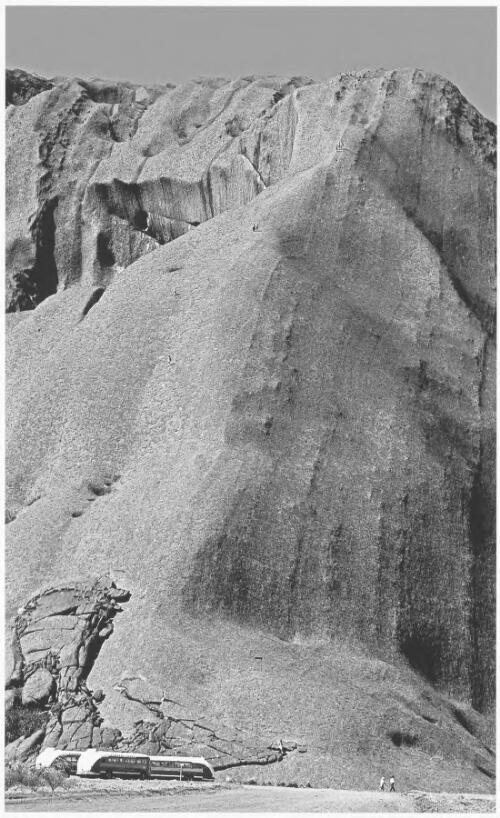 Tourists climbing Uluru, Northern Territory, 1965 [picture] / Jeff Carter