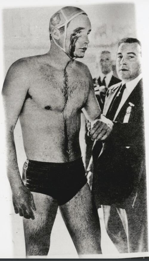 Ervin Zador of Hungary comes out of the pool with blood streaming from a gash over his eye, Melbourne, Victoria, 1956 [picture] / Bruce Howard