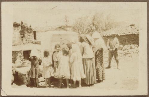 Women and children gathered around a well in Mudros, Lemnos Island, Greece, May 1915 / W.A.S. Dunlop