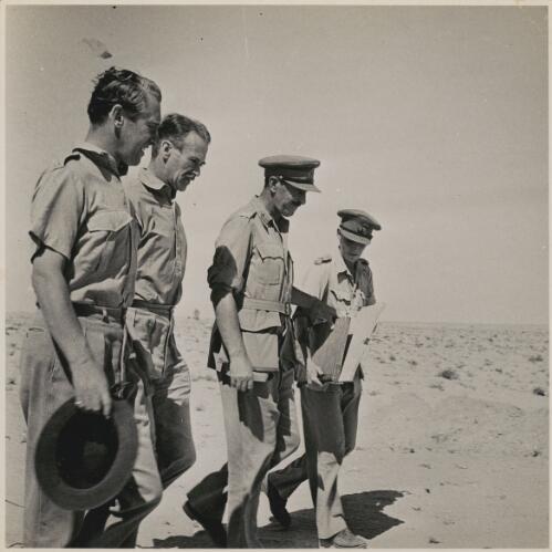 R.G. Casey (second from left) with military personnel in the Western Desert, North Africa, September 1942 [picture]