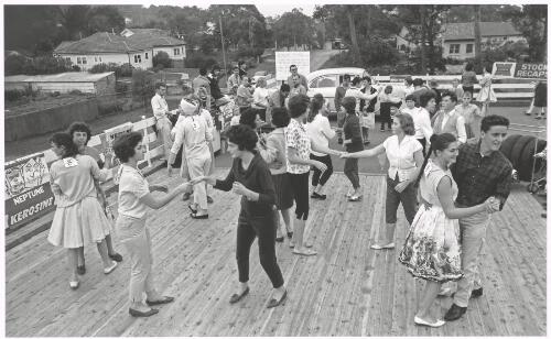 Contestants dancing on the outdoor dance floor during the dance-a-thon, Caringbah, New South Wales, 1961, 2 [picture] / Jeff Carter