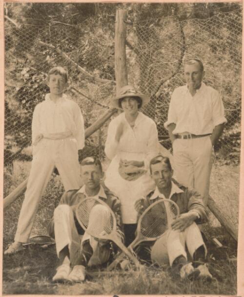 Pax Cunningham, Peggy Cunningham, Ron Irving and two men, all dressed in tennis clothing, Lanyon, Canberra, approximately 1920 / W. A. S. Dunlop
