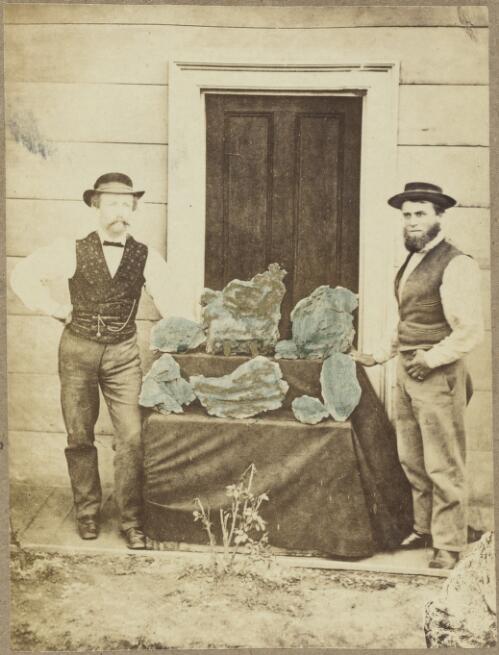 Gold nuggets from the Star of Hope mine, with B.O. Holtermann on left and Louis Beyers on right of doorway, Hill End, New South Wales, ca.1872 [picture]