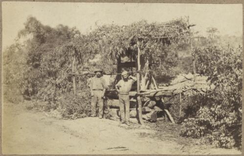 Two miners beside a gold mine head, Hill End Region, New South Wales, ca.1872 [picture]