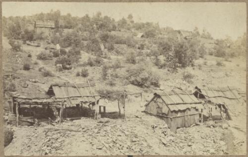 Gold miners' bark huts and gold mines on hillside, Hill End region, New South Wales, ca.1872 [picture]
