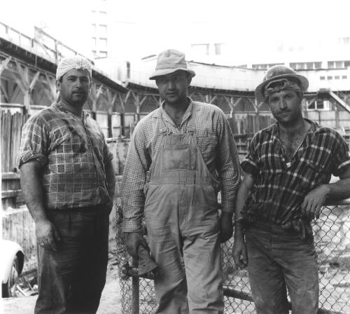 Three building site workers, Bligh Street, CBD, Sydney, 1965 [picture] / Raymond de Berquelle