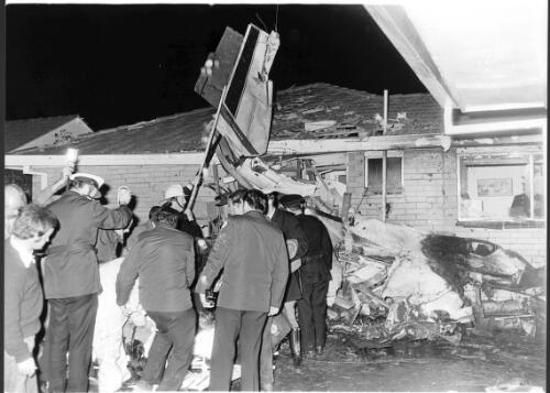 The plane came to rest against a second house after it had crashed shortly after take-off from Essendon Airport, July 1978 [picture] / Bruce Howard