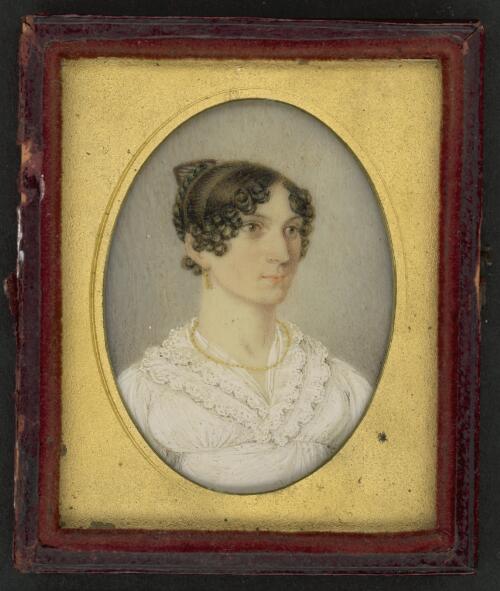 Portrait of unidentified young woman wearing white dress with lace trim, gold chain and earrings [picture]