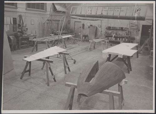 MacRobertson Miller Aviation dope room and fabric workshop with aircraft parts at Maylands Aerodrome, Perth, ca. 1943 [picture]