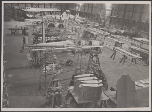 MacRobertson Miller Aviation airframe overhaul and repair section workshop with de Havilland biplane parts at Maylands Aerodrome, Perth, ca. 1943 [picture]