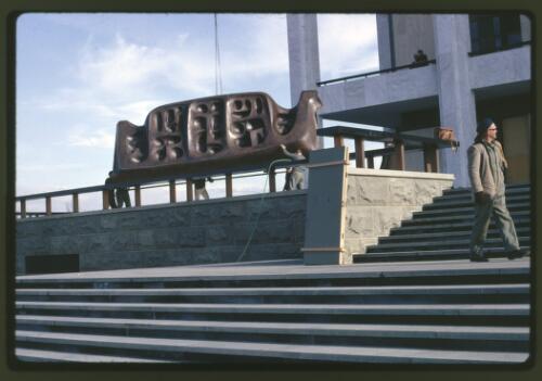 Moving the Tom Bass lintel sculpture onto the podium by crane at the National Library of Australia, Canberra, Australian Capital Territory, July 1968, 6 [transparency] / Kevin Goodridge