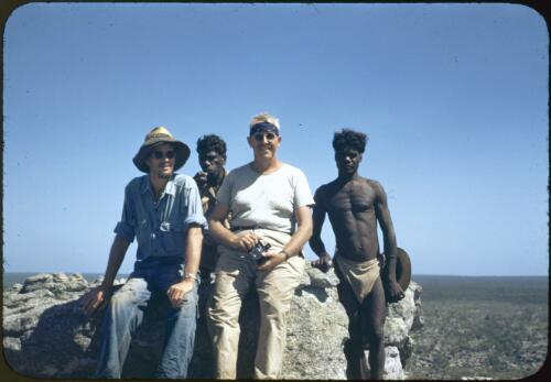 Bob Miller, Frank Setzler and Aboriginal Australians atop Central Hill, Groote Eylandt, Northern Territory, 25 May 1948 [transparency] / photo by Fred McCarthy