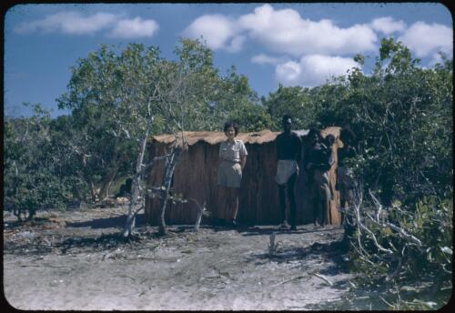 Margaret McArthur and an Aboriginal family at her camp at Port Bradshaw, Northern Territory, 26 July 1948 [transparency] / Robert Miller