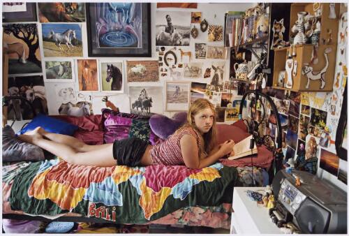 Hannah Beilharz reads in her bedroom, as part of home schooling, Lower Templestowe, Victoria, 6 February 2008 [picture] / Dave Tacon