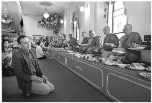 Western Buddhist devotee providing offering to monks, Kitani ceremony, Prayer Hall of Wat  Buddharangsee (Thai Buddhist temple), Trafalga Road, Annandale, Sydney, 27 October 2002 [picture] / Philip Gostelow