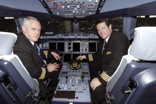 Qantas pilot captains Murray Crockett left, and Peter Probert in the A380 airbus cockpit, Sydney, 21 September 2008 [picture] / Robert James Wallace