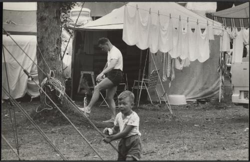 Nappies hang on a rope clothesline in a camping ground, Australia, ca. 1960 [picture] / Jeff Carter