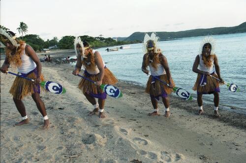Torres Strait Island men performing a dance as part of the Arpaka Dance Group, Thursday Island, Queensland, 2008, 2 [picture] / Charles J. Page