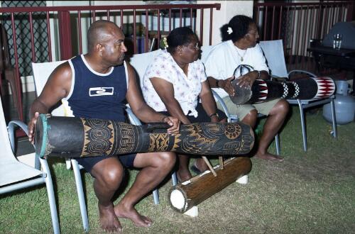 Torres Strait Islanders holding warups, drums used for dance culture, Thursday Island, Queensland, 2008 [picture] / Charles J. Page