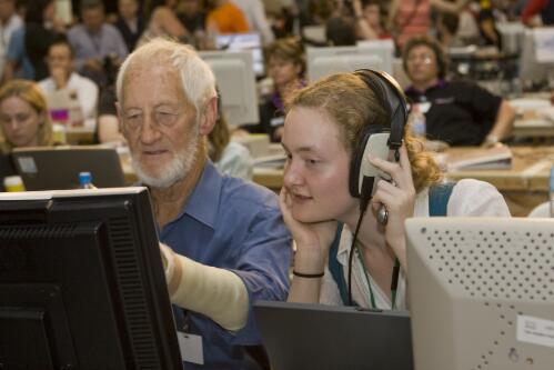 Professor Dean Jaensch providing analysis for ABC radio and explaining the results to Kate McMurtrie in the National Tally Room during the Australian Federal Elections, Canberra, 24 November 2007 [picture] / Mark Arundel