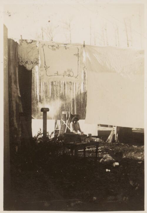 Mrs Molly Gillies at her home in Horsefall 1941/1942 washing after a house fire [picture]