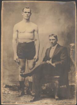 [Portrait of boxer 'Boshter' Bill Squires with trainer Jim Russell ...