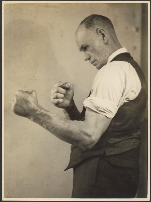 Portrait of Bill Squires in boxing pose [picture] / S. J. Hood