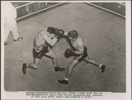 Andre Famechon blocks a right hand blow by Kevin Delaney in their bout at Rushcutter's Bay Stadium on September 12th, 1949, which was declared a draw [picture]