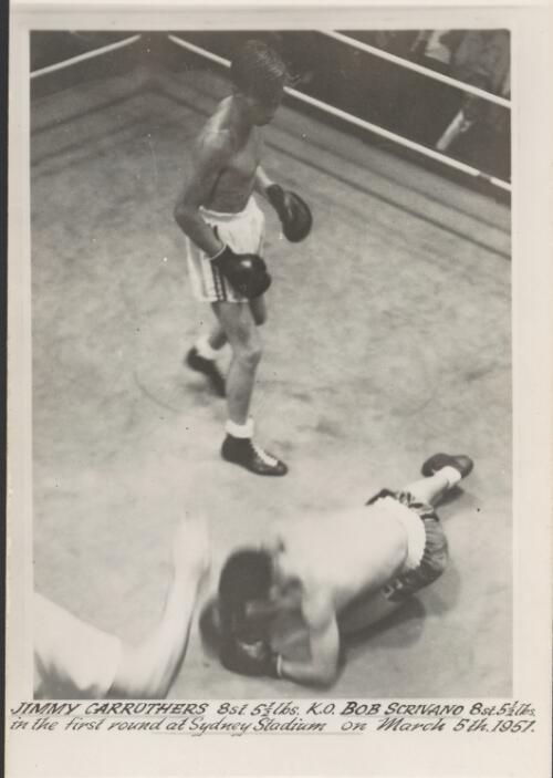 Jimmy Carruthers, 8 st. 5 1/2 lbs., [knocks out] Bob Scrivano, 8 st. 5 1/2 lbs., in the first round at Sydney Stadium on March 5th, 1951 [picture]