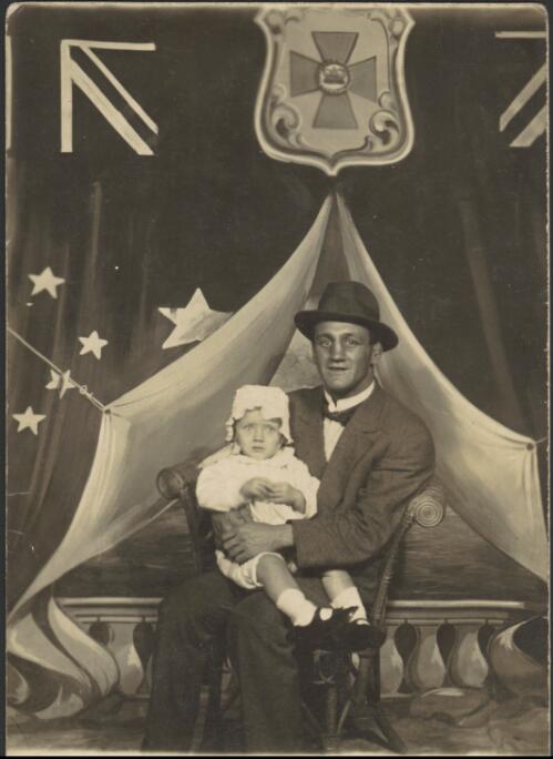 Portrait of Herb McCoy with a child [picture]