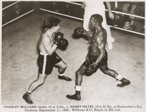 Charley Williams, 10 st. 8 lbs., versus Harry Hayes, 10 st. 6 3/4 lbs., at Rushcutters Bay Stadium, New South Wales,  September 11, 1950 [picture]