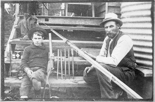 Whaling equipment: George Davidson with a handgun and his son Wallace holding a shoulder gun, Twofold Bay [picture]