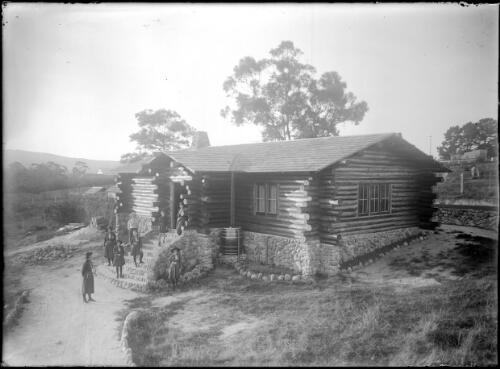Exterior of Girl Guides hall with Girl Guides in uniform, Eden, ca. 1936 [picture]