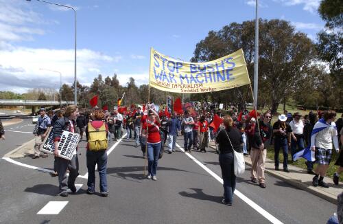 [Demonstration with banner 'Stop Bush's war machine', in Canberra during the visit of President Bush, 23 October 2003] [picture] / Loui Seselja