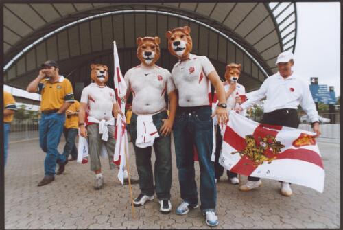 English Lions Rugby Union supporters outside the Olympic Park Train Station before the Rugby World Cup final, Sydney, November 2003 [picture] / Ben Rushton