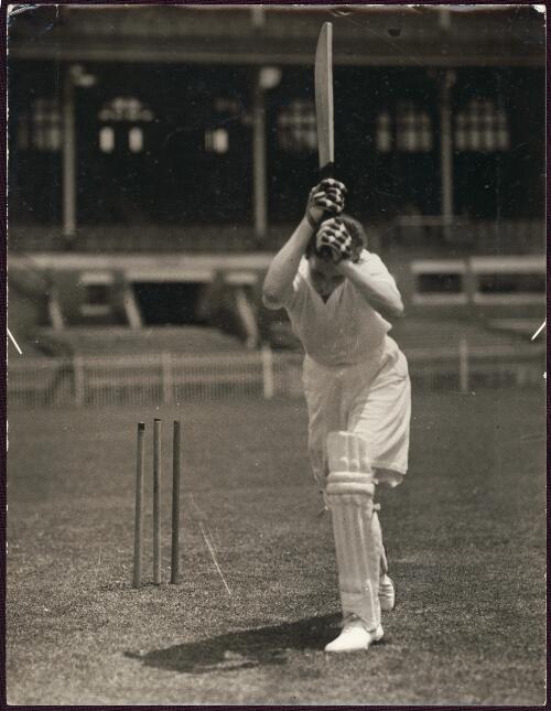 Joy Liebert swinging her bat in the air, after being bowled out, English women's cricket tour of Australia and New Zealand, 1935 [picture]