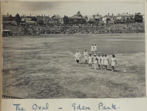 Oval at Eden Park, Auckland, Women's cricket team entering the field, Tuesday January 29th, 1935 [picture]