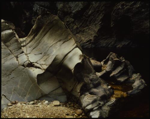 Polished quartz rocks in Marriotts Gorge, Denison River, Tasmania, 1979 [transparency] / Peter Dombrovskis