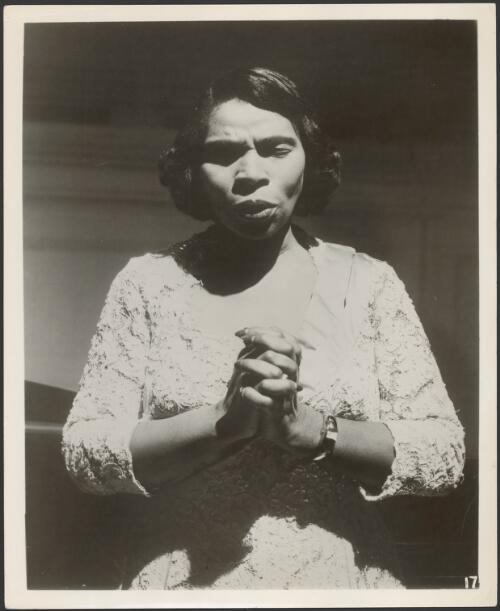 [Marian Anderson in white lace dress singing, 194-?] [picture]
