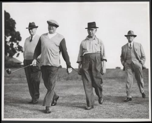 John Charles Thomas steps out on his first game of golf at Cheltenham, Melbourne [accompanied by] J.H. Tait, George Sutherland and Mr McGee, [1947?] [picture]