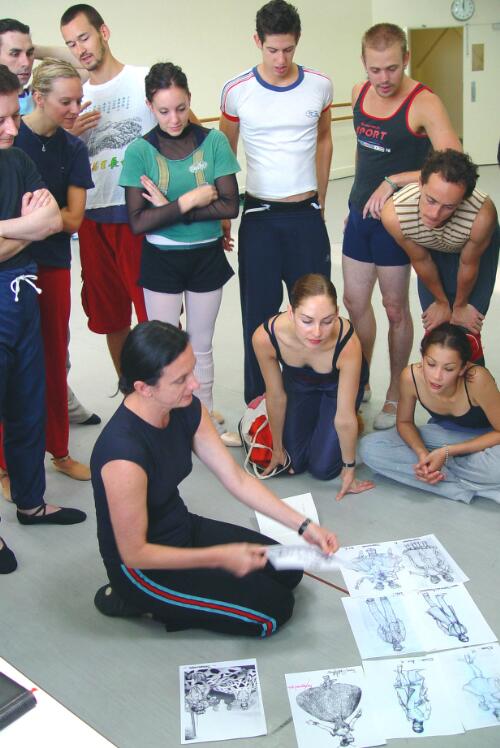 Meryl Tankard with dancers of The Australian Ballet discussing costume designs for Wild Swans [picture] / Regis Lansac