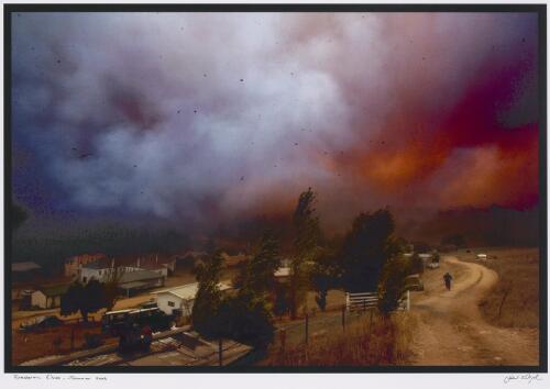 At 1.30 pm on January 30th wildfire finally hits without mercy, by 2.00 pm from a hilltop I photograph the small town of Omeo ablaze [picture] / Simon O'Dwyer